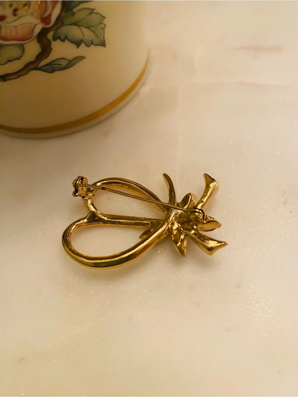 Gold-Tone Crystal Ribbon Brooch with Multi-Colored Gem Accents (Like New)
